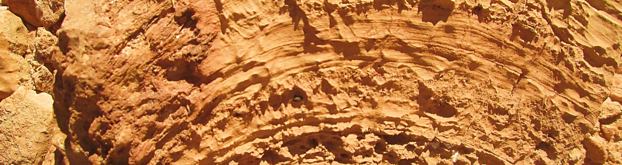 Layered red sandstone outcrop